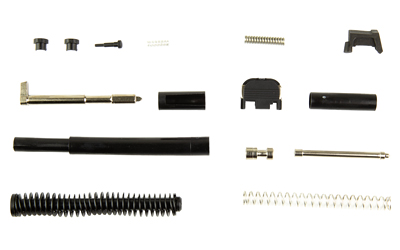 Disassembled handgun parts laid out on white background