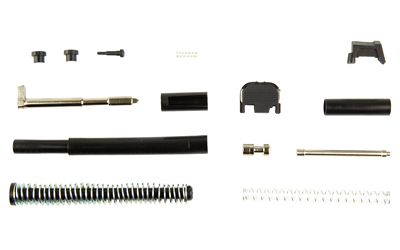 Disassembled handgun parts laid out on white background
