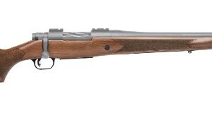 Bolt-action rifle with wooden stock on white background
