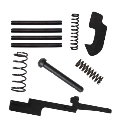Disassembled firearm parts including springs and metal components