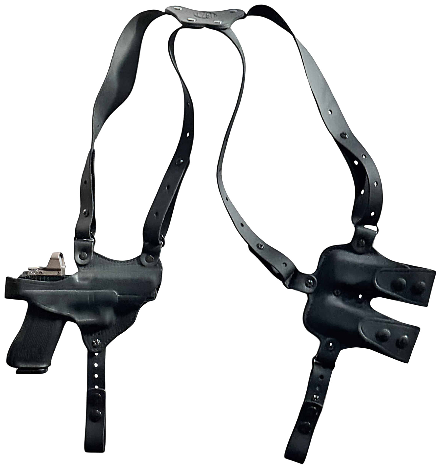 Black leather shoulder holster with handgun
