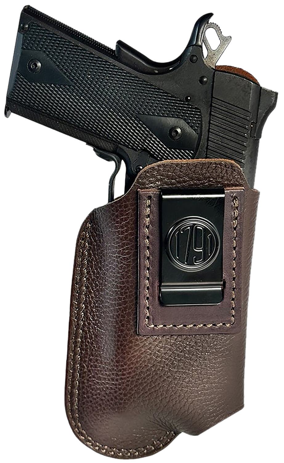 Handgun in brown leather holster with metal clip