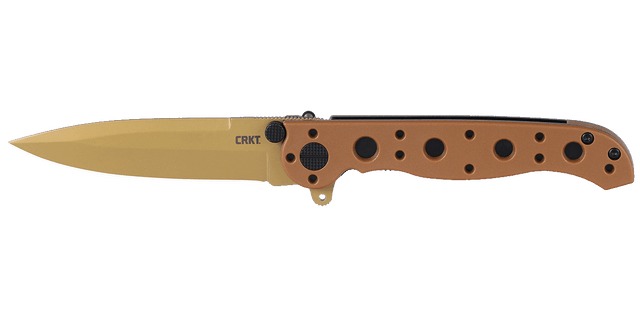 Tan folding pocket knife on white background
