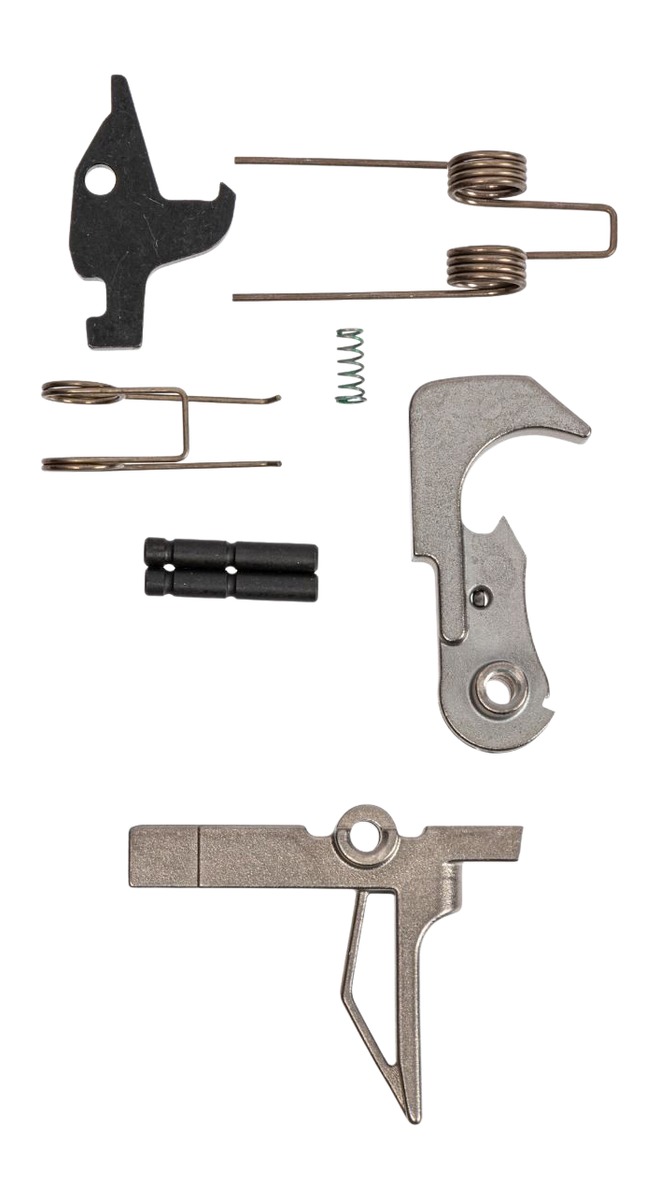 Disassembled metal trigger mechanism components with springs
