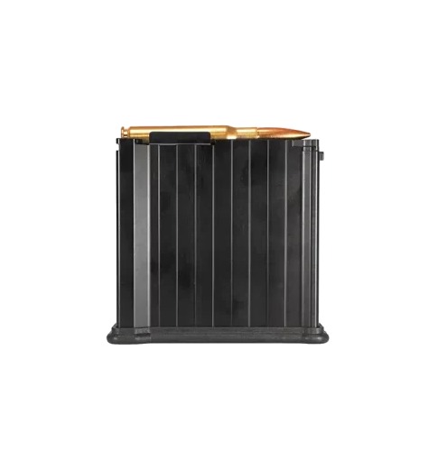 Black rifle magazine with single cartridge on top
