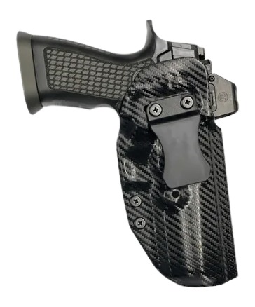 Handgun in carbon fiber holster with clip