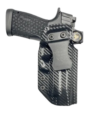 Handgun in carbon fiber holster with clip