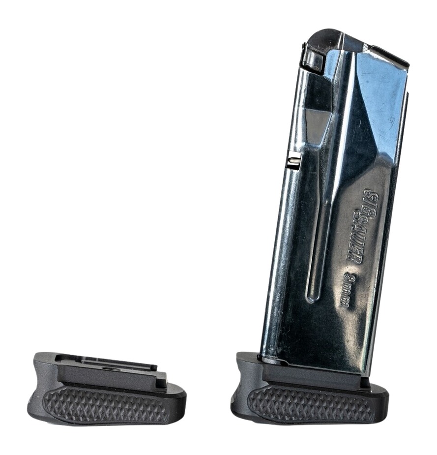 Two metal handgun magazines with grip extensions
