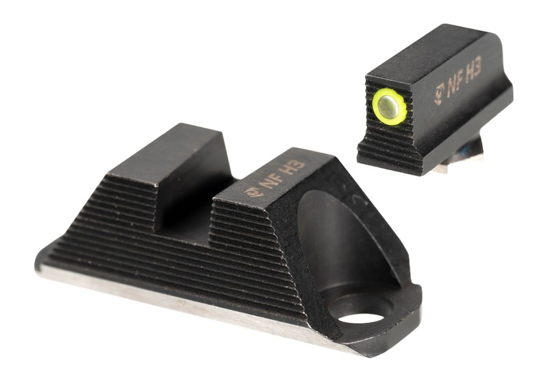 Black pistol sights with green fiber optic insert