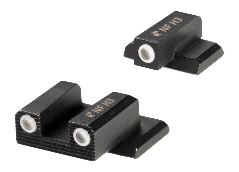 Black pistol night sights with white dots
