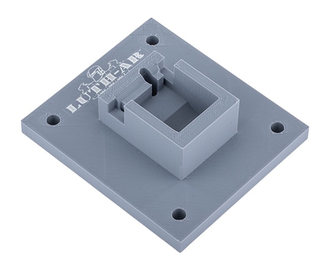 Gray 3D-printed square base with raised cavity