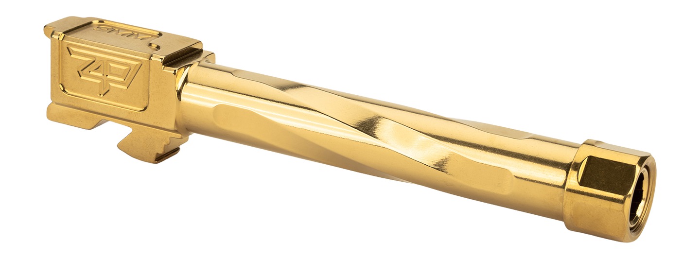 Gold fluted pistol barrel on white background