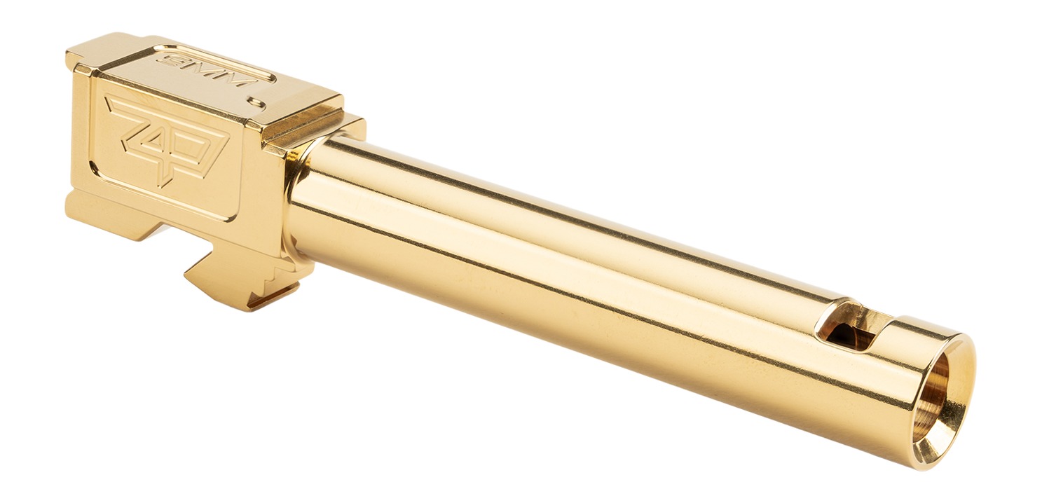 Gold-plated pistol barrel on white background
