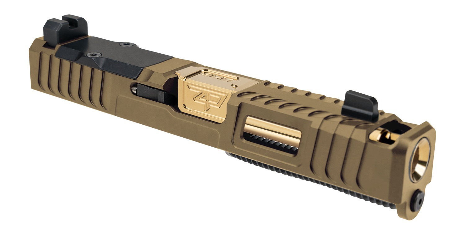 Tan and gold pistol slide with sights