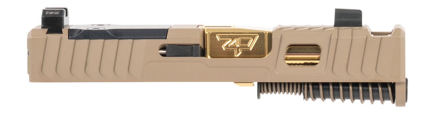 Tan pistol slide with gold barrel and spring