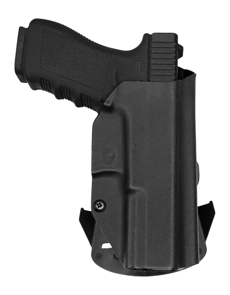 Black handgun in molded holster on white background