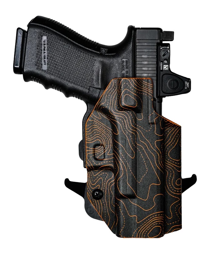 Handgun in black holster with orange pattern