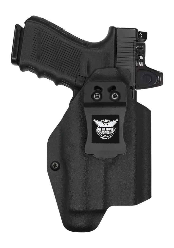 Black handgun in Kydex holster with optic