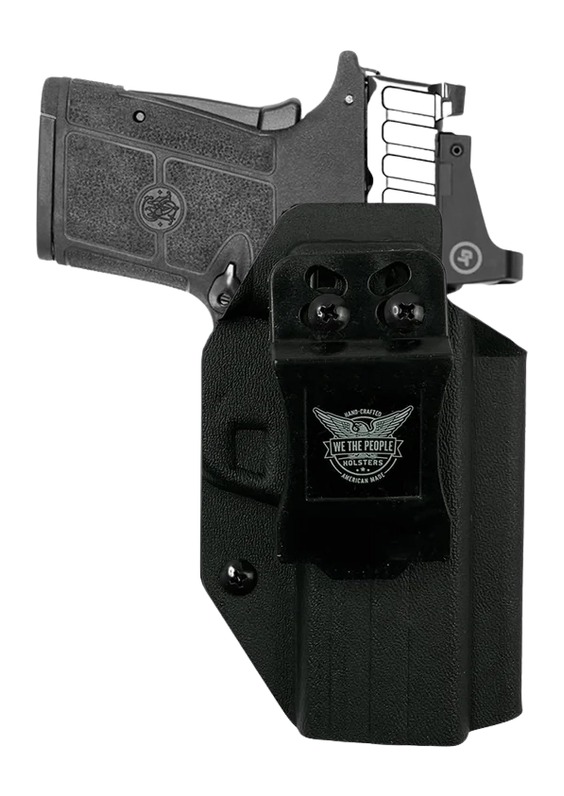 Handgun in black concealed carry holster