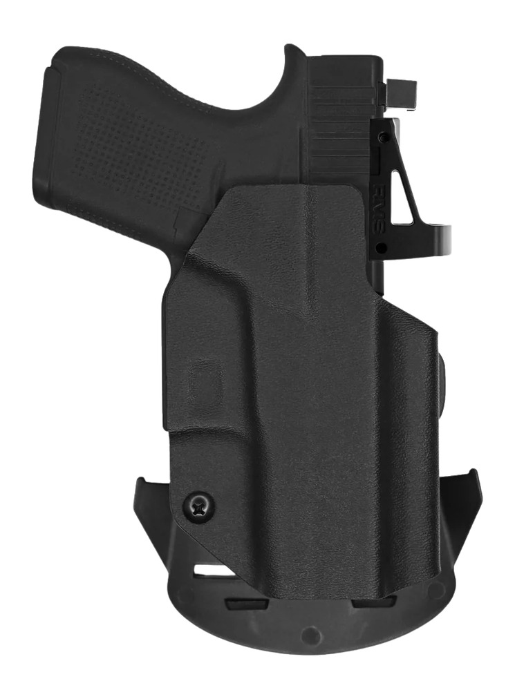 Black handgun in molded holster with optic