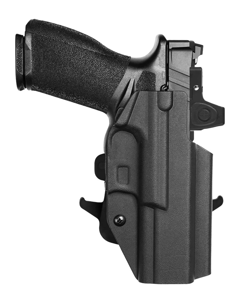 Black handgun in molded polymer holster