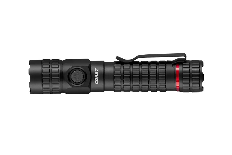 Black tactical flashlight with pocket clip and red accent