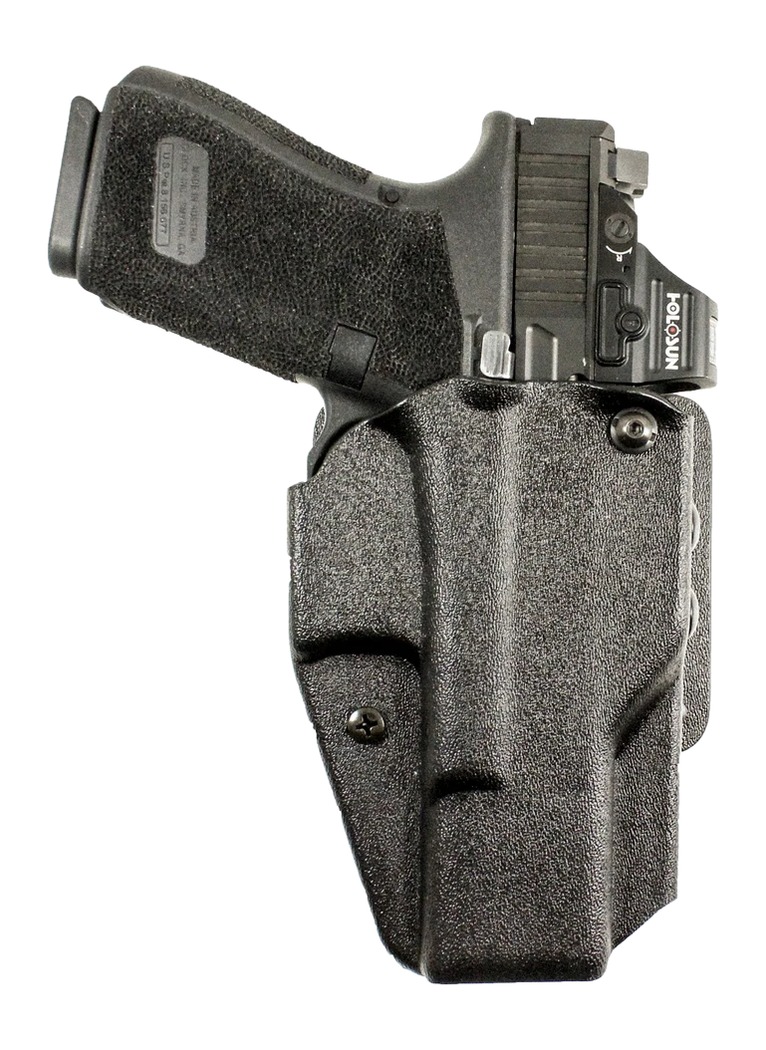Handgun in black holster with red dot