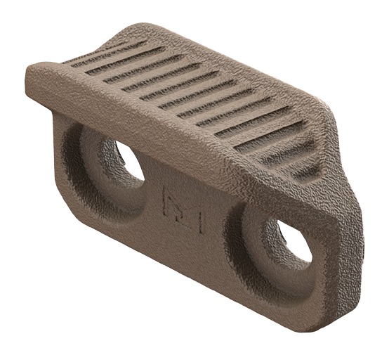 Textured wedge-shaped block with two circular holes