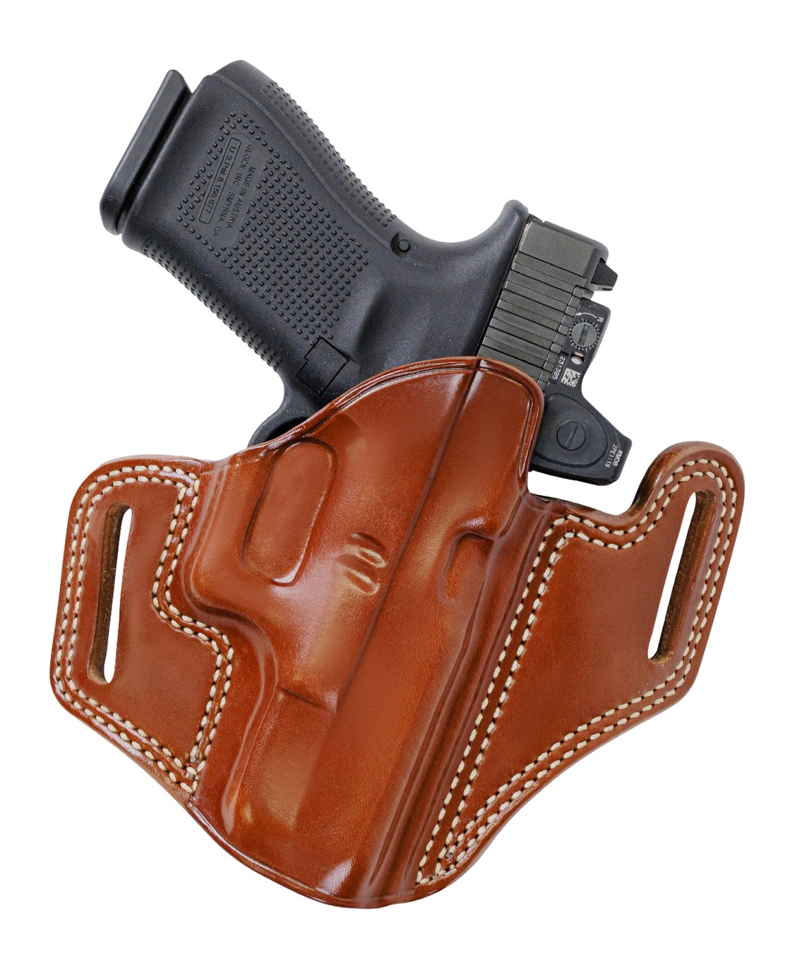 Handgun in brown leather belt holster