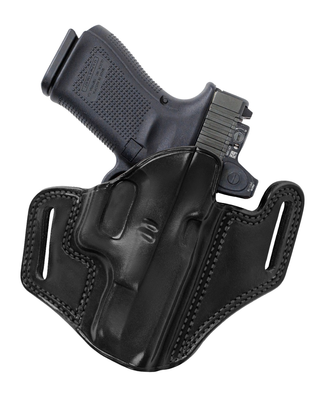 Black handgun in leather belt holster