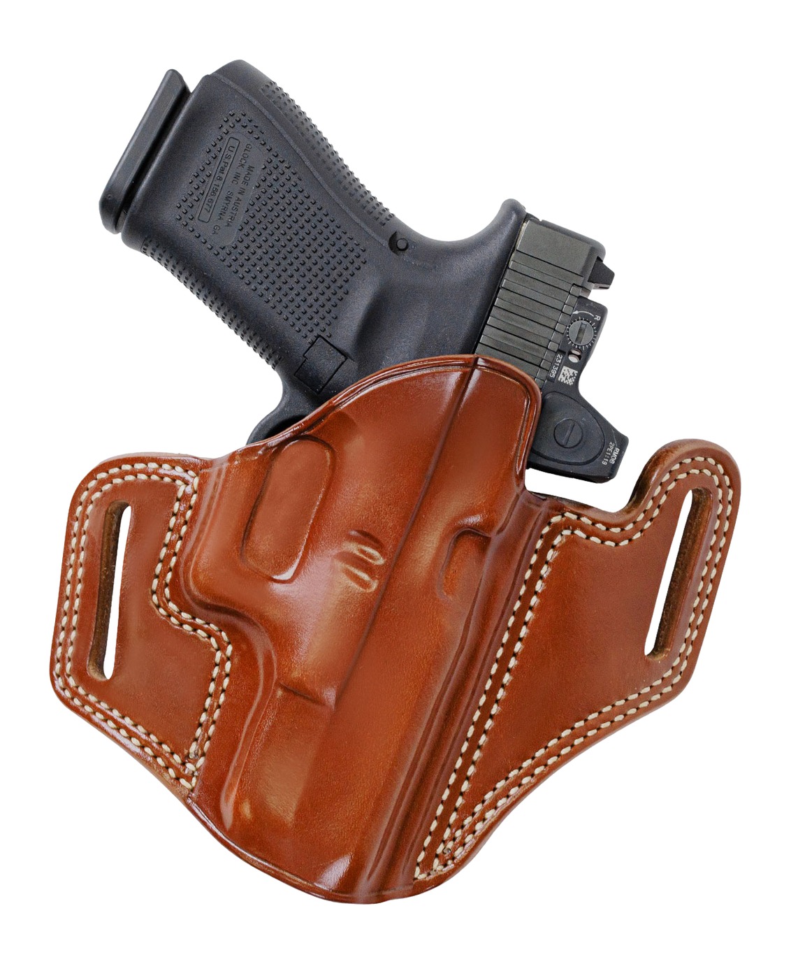 Handgun in brown leather holster on white background