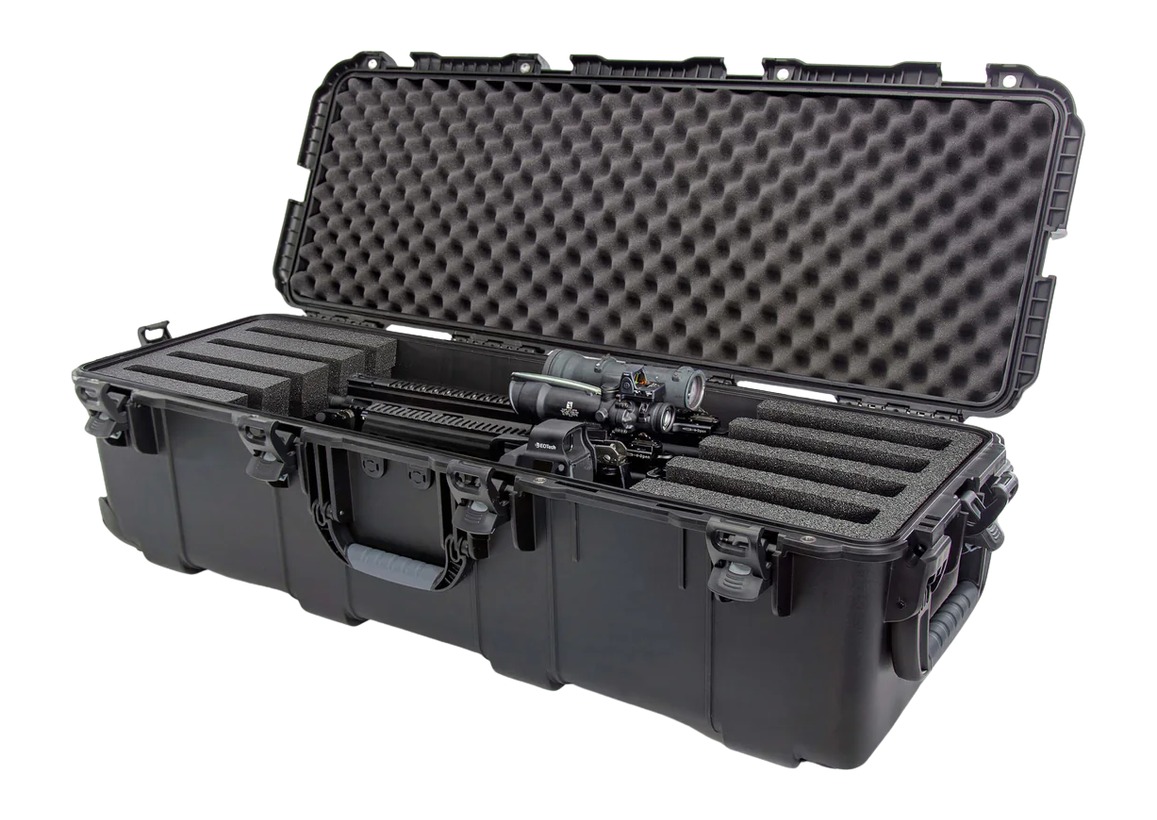 Open hard rifle case with scoped firearm