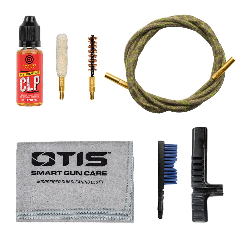 Gun cleaning kit with lubricant, brushes, and cloth