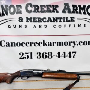 Canoe Creek Armory sign with shotgun display