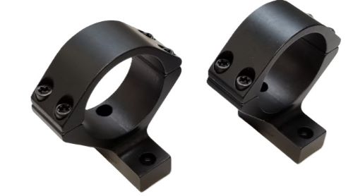 Black metal scope rings on white background