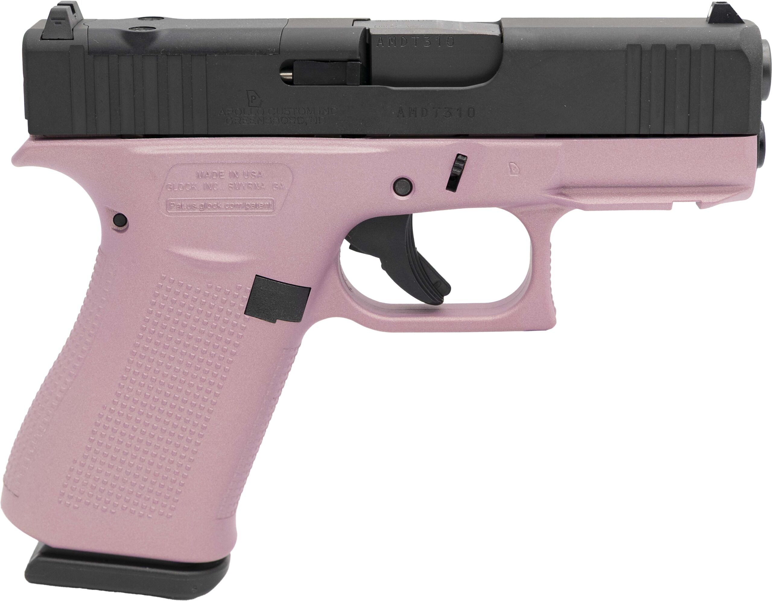 Pink and black semi-automatic handgun close-up