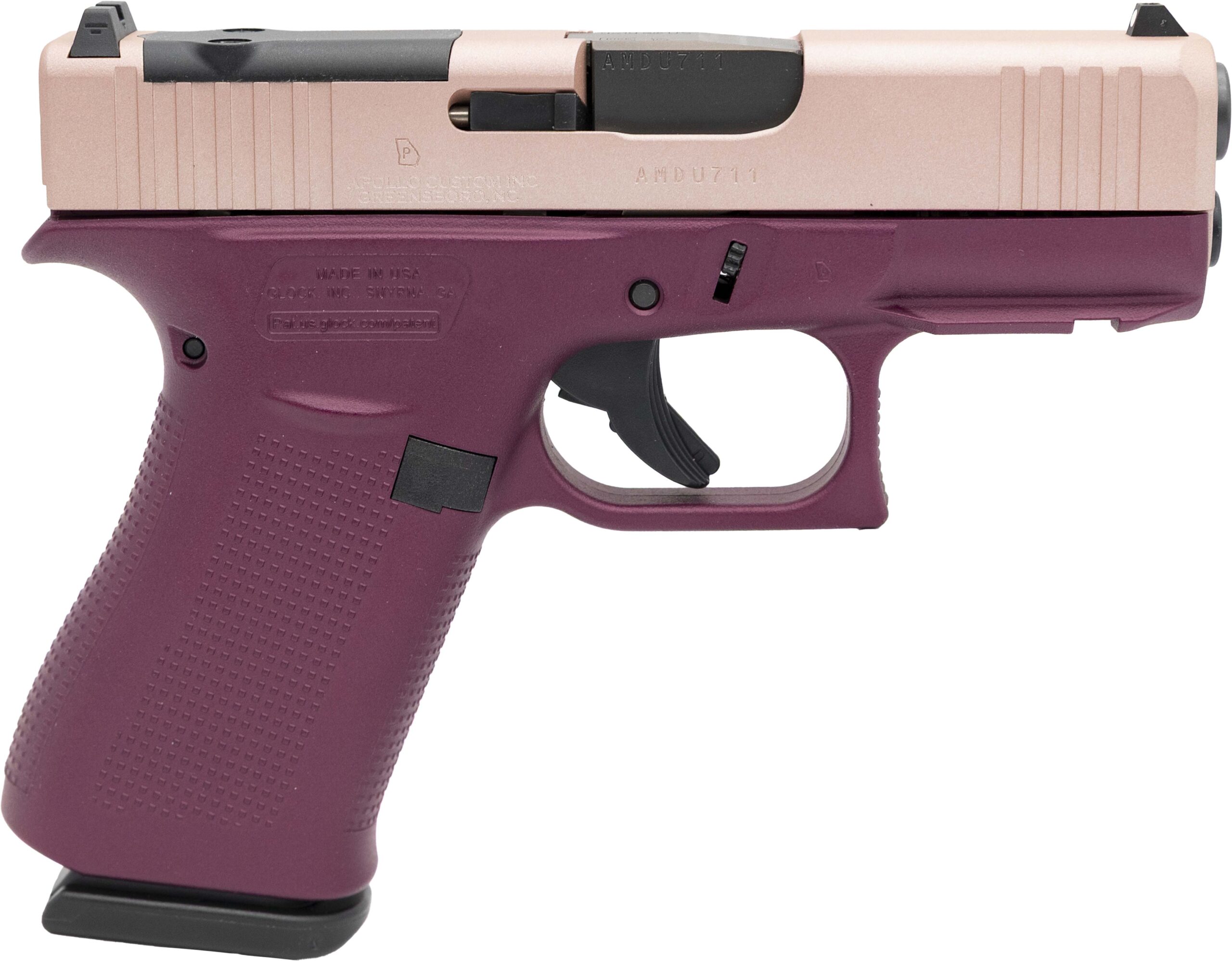 Two-tone Glock handgun on white background