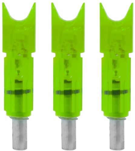 Three green illuminated arrow nocks on white background