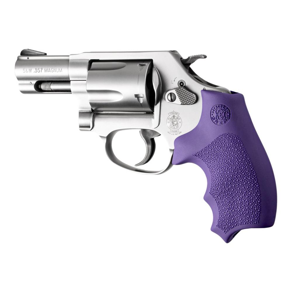 Silver revolver with purple grip on white background