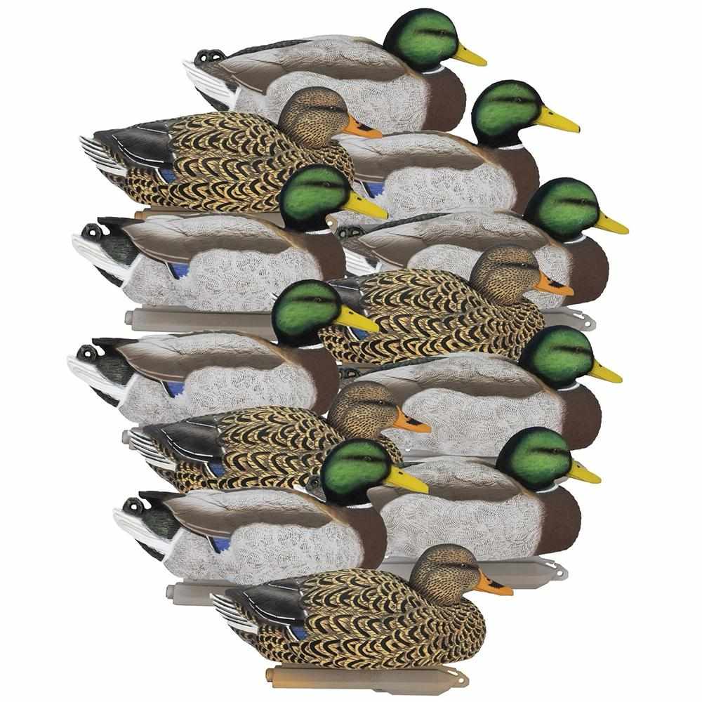 Stacked mallard duck decoys on white background