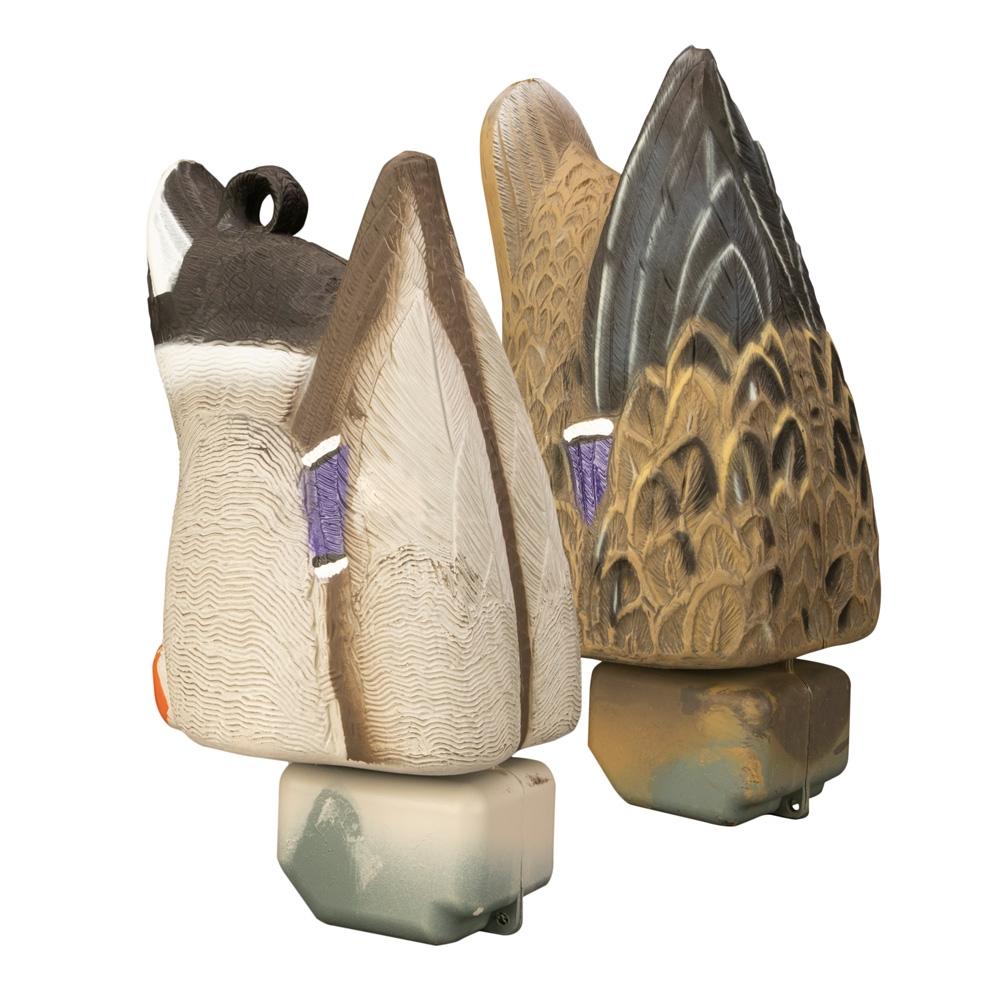 Decorative carved duck decoys mounted on bases