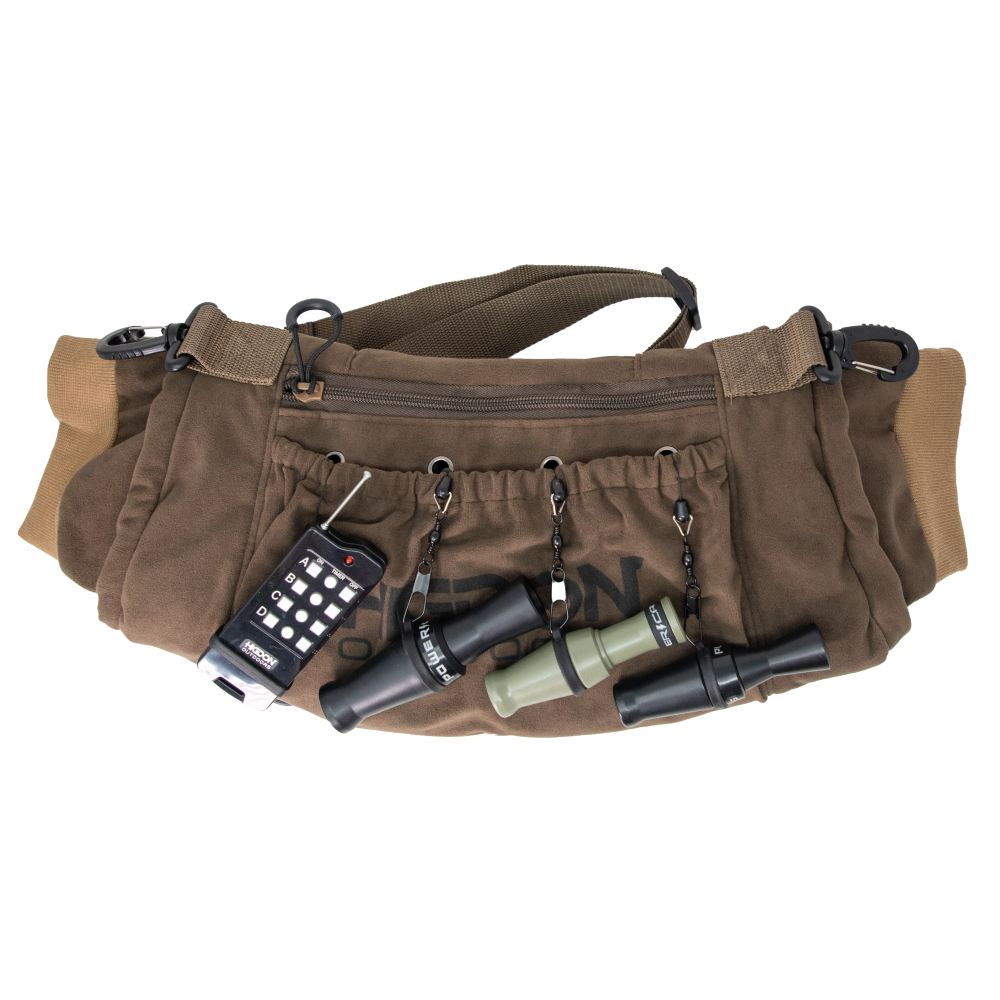Brown hunting waist pack with duck calls attached
