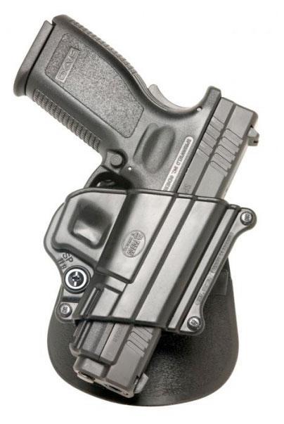 Black semi-automatic handgun in holster on stand