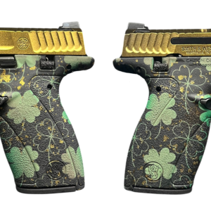 Gold slide pistol with green shamrock grip
