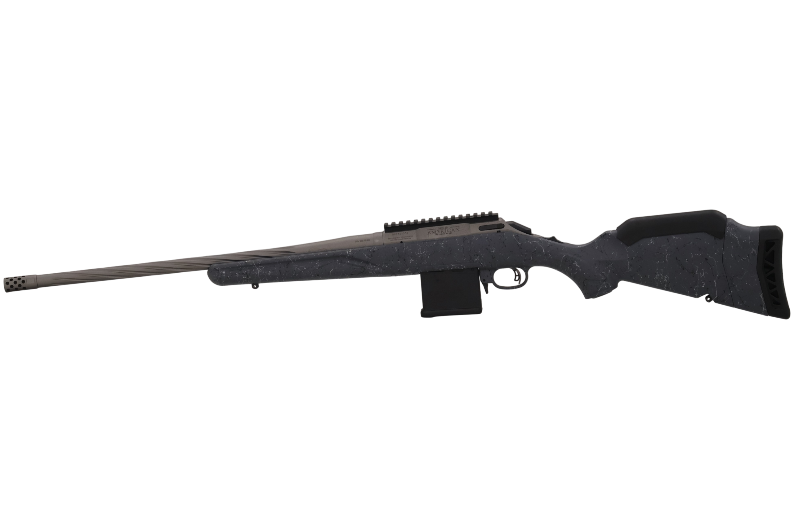 Bolt-action rifle with fluted barrel and magazine