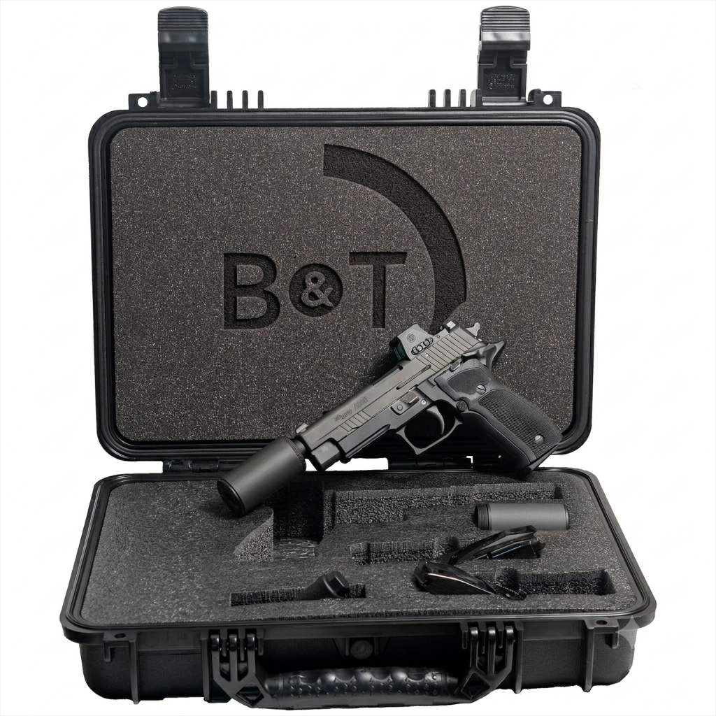 Handgun with suppressor in foam-lined carrying case
