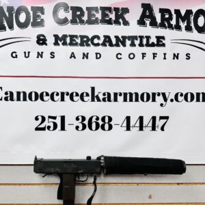 Canoe Creek Armory sign with firearm on counter
