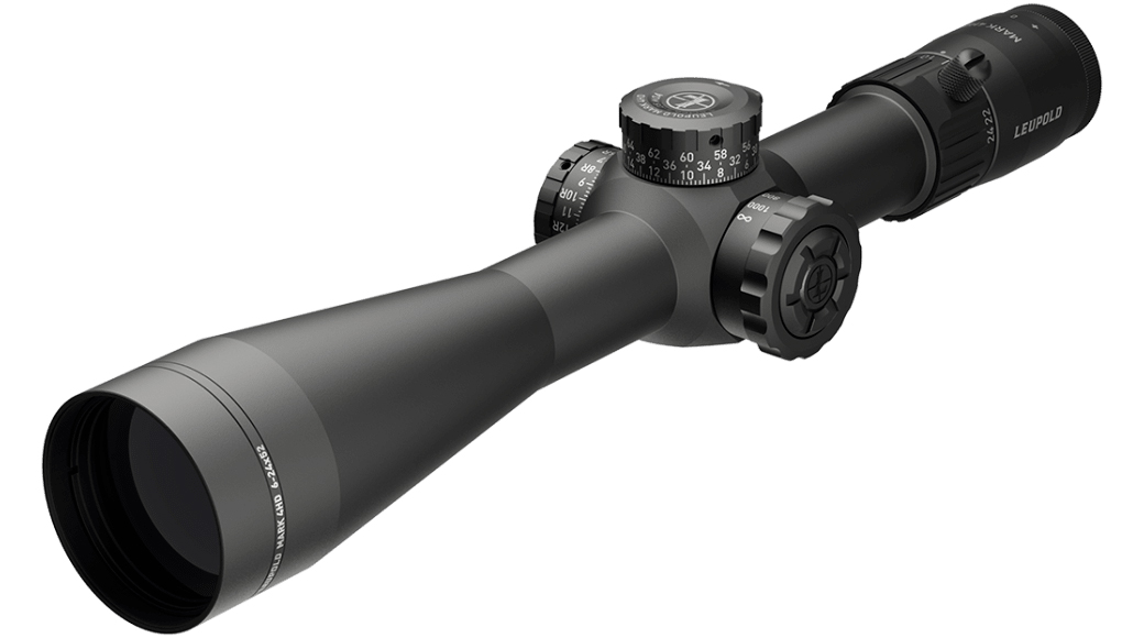 Black tactical rifle scope with adjustment turrets