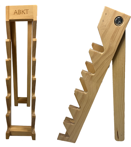Wooden adjustable notched stand with ABKT branding