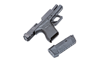 Black semi-automatic pistol with detached magazine